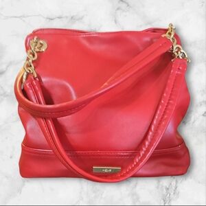 HEYS red purse with hold chain detail